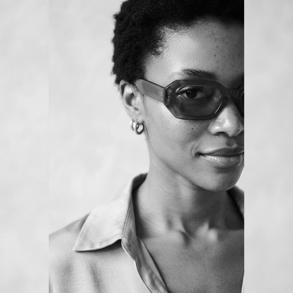 A woman wearing statement sunglasses